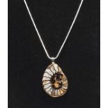 A polished split Ammonite on Sterling silver chain