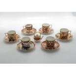 Six Royal Crown Derby Curators Collection coffee cans and saucers together with a miniature teapot