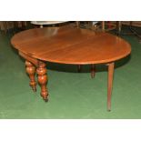 A mahogany dining table