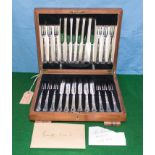 A canteen of fruit cutlery the property of the George Formby estate sold at auction in 1961, with