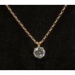 A 9ct gold chain and pendant