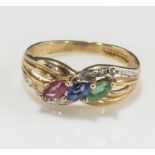 A 9ct gold lady's ring set with peridot and amethyst