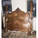 A mahogany French double bed
