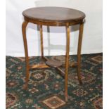 A mahogany occasional table