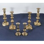 Three pairs of brass candlesticks