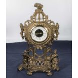 A brass mantle clock