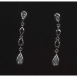 A 9ct white gold set with diamonds drop earrings