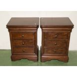 A pair of good quality mahogany bed side drawers
