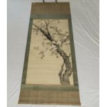 A fine quality Meiji period Japanese scroll painting of birds in cherry blossom signed with artist's