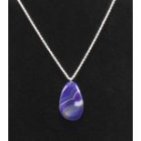A polished purple agate slice on heavy Sterling silver chain