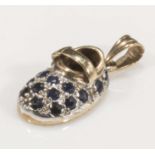 A 9ct gold slipper charm set with sapphires