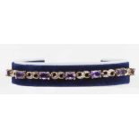 A 9ct gold bracelet set with amethyst and diamonds