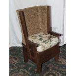 A 20th century Scottish oak and woven straw Orkney chair