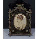A 19th century miniature of a young lady