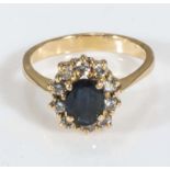 18ct yellow gold sapphire and diamond cluster ring, 50 point