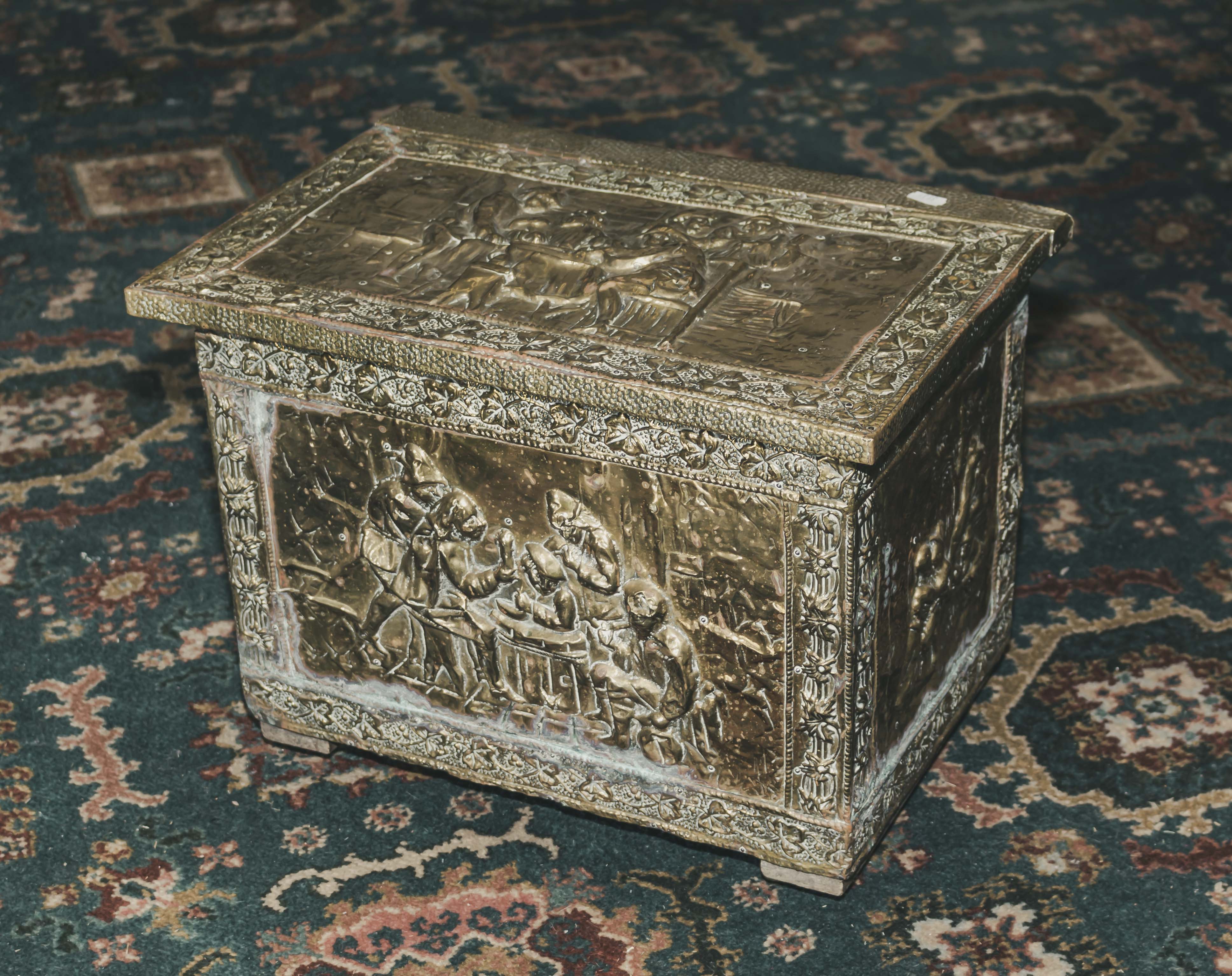 A brass log box