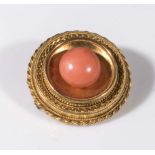A 9ct gold brooch set with coral