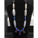 Ancient agate with silver adornments, titanium quartz and blue glass necklace