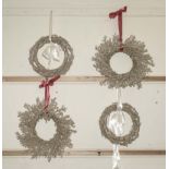 Four silver and gold Christmas wreaths