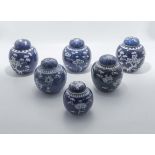 Six 19th/20th century Chinese blue ground prunus ginger jars