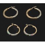 Two pairs of 9ct gold hoop earrings