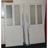 A pair of glazed sliding partition doors