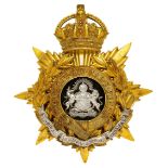 Manchester Regiment Officer’s helmet plate circa 1901-14. A good gilt example. Crowned star