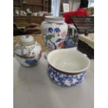 A selection of ceramics to include a modern oriental vase, a ginger jar and a bowl