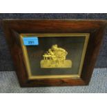 A Victorian gilded metal plaque of a seated man with pipe and jug, glazed, frame