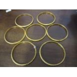 Seven gilt bangles