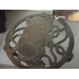 A 1920s original Bonzo the dog cast iron trivet, 3 1/2" h x 6 " dia