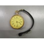 An early 20th century 14ct gold plated, hand wound pocket watch with white enamel Roman dial, the