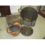 A large brass charger, a figured coal box, a fire guard and miscellaneous metal ware