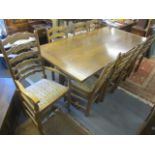 A large reproduction English oak refectory dining table, 29 1/2" h x 81 1/2"w and a set of eight