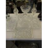 Glassware to include a pair of pedestal storm lamps with line decoration, a large bowl, a pedestal