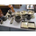 A mixed lot of metalware to include trays, an inkwells, an Indian metal vase, fish knives and