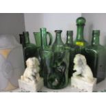 Mid 20th century green glass to include a crackle glaze bottle and other glassware together with a