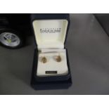 A pair of 9ct gold Millennium celebration earrings