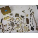 A quantity of mother of pearl emblems, mixed costume jewellery to include rings, a small leather and