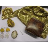 A vintage gilt evening clutch and purse, white metal Art Nouveau style earrings, a cameo, pins and a