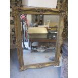 A modern gilt framed wall hanging mirror, 42" x 30 1/2"