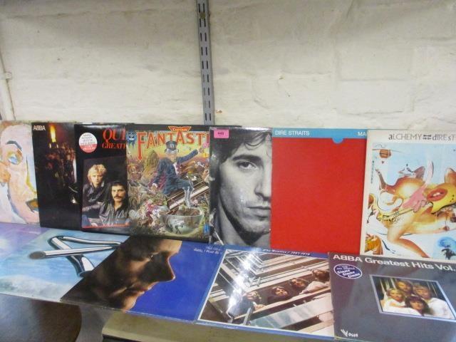 A quantity of late 20th century LPs to include Bob Dylan, Dire Straits, Queen and The Beatles