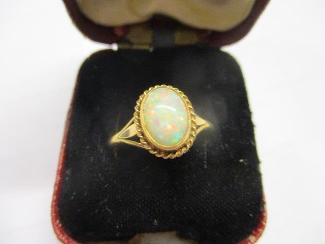 A 9ct gold opal ring