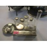 Mixed silver topped dressing table items, together with a white metal dish