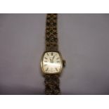 A 9ct gold Tissot ladies watch