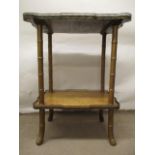 A late 19th century gold painted and birdseye maple two tier occasional table with pierced brass