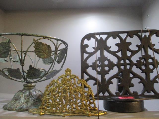 A modern wrought iron recipe book stand and other items
