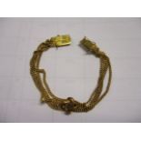 An 18ct gold bracelet, 11.7g