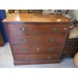 An Edwardian walnut chest of two short and three long drawers, on a plinth base, 40 1/2" h x 41 3/