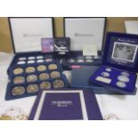 A Westminster silver proof set of twenty four Man in Flight coins, a five coin Masterpieces in